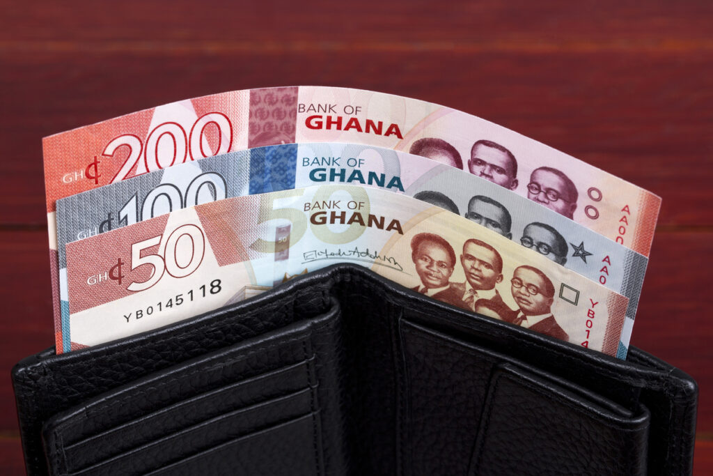 Ghanaian cedi in the black wallet